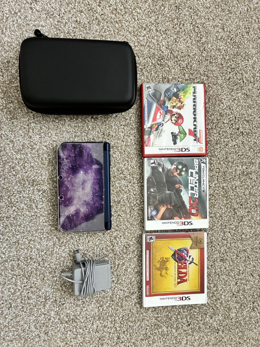 Nintendo New 3DS XL Galaxy Style Bundle with Charger, Case, and 3 Games