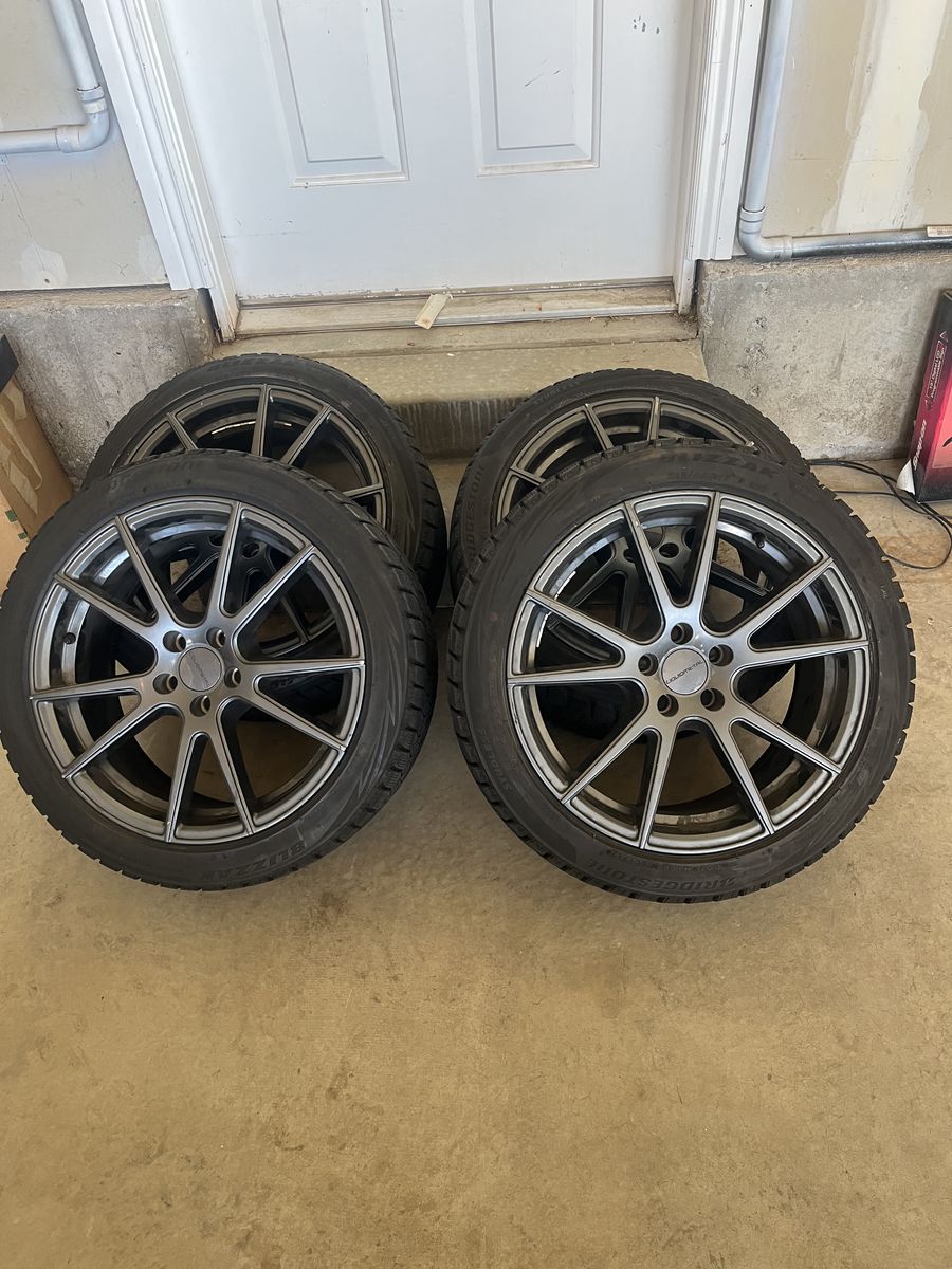 2017 Toyota Pruis Set of 4.....215/45/17inch snow tires and aluminum rims