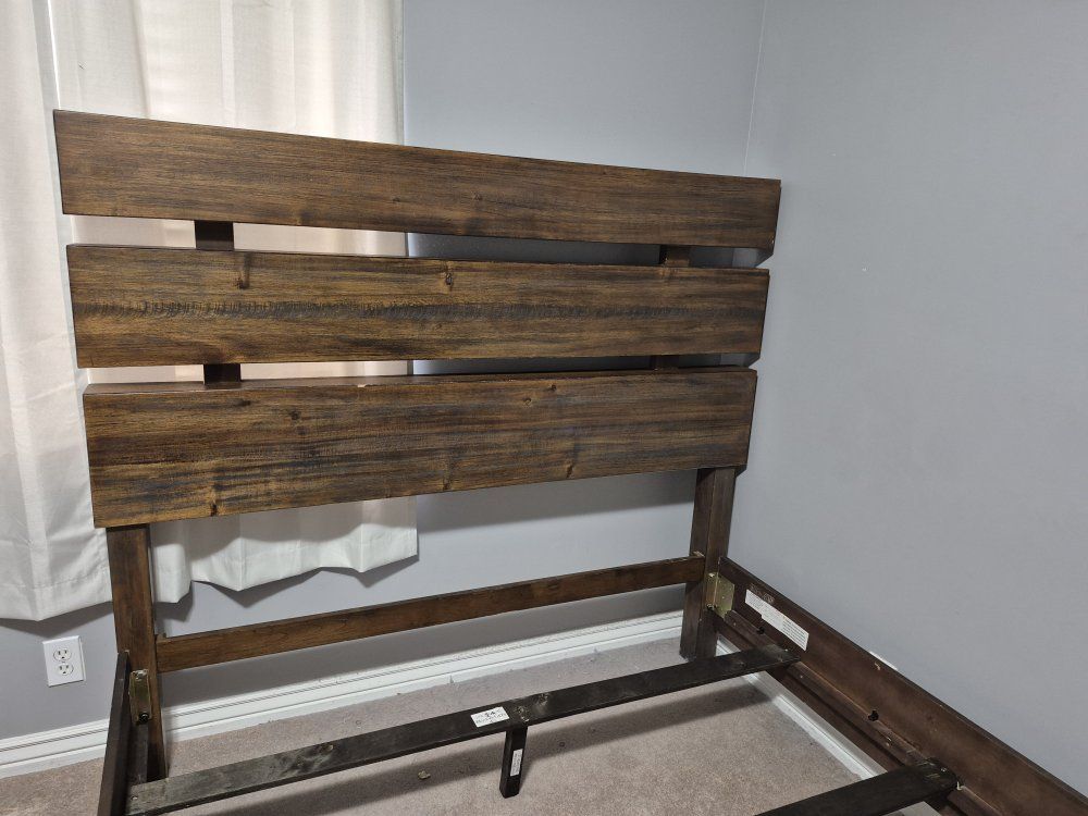 Solid Wood Queen bed Frame in good condition. Good