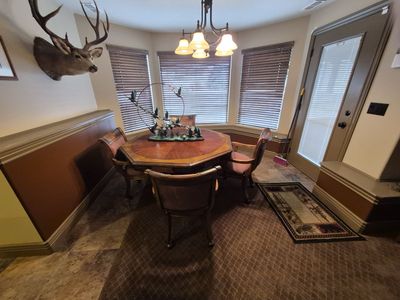 Game table, to flips for dinner table $1200 verily used like new