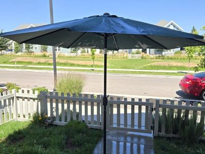 Used Patio Umbrella - Dark Green, Crank Open/Close Mechanism, Weather Resistant, Large Outdoor Shade