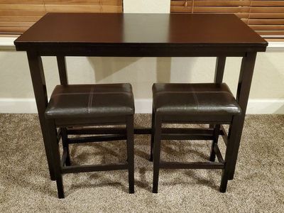 Counter height table with stools