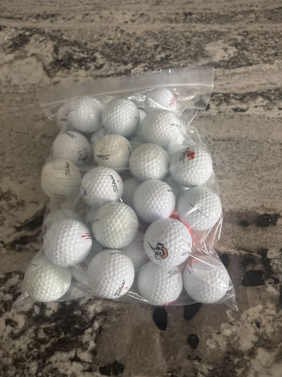 34 Used Titleist Golf Balls