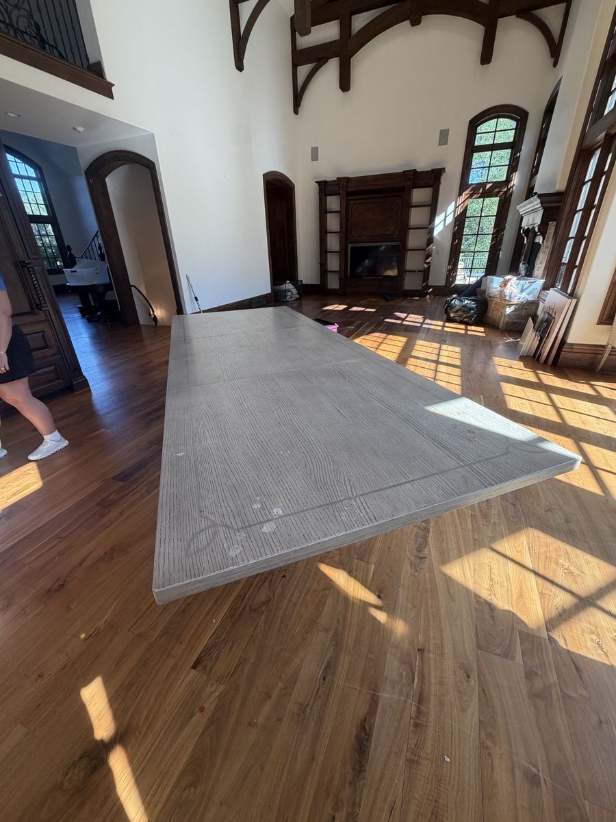 Bernhard Wood table 88-128”. Leaves are 20” each. 48” wide and 31” high.