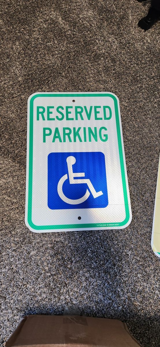 (2 Pack) Reserved Handicap Parking Sign with Wheelchair Picture, 18" x 12"