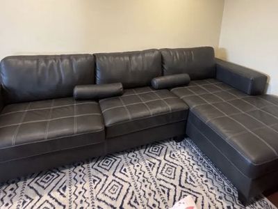 Black Faux Leather Sectional Sofa with Chaise and Bolster Pillows