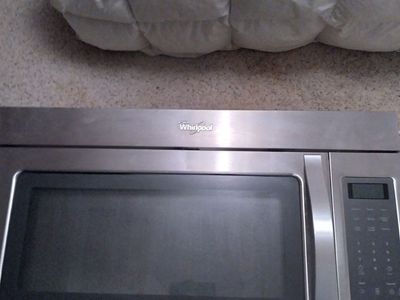 STAINLESS STEEL OVER THE STOVE MICROWAVE