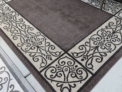 Brown and Beige Scroll Pattern Area Rug