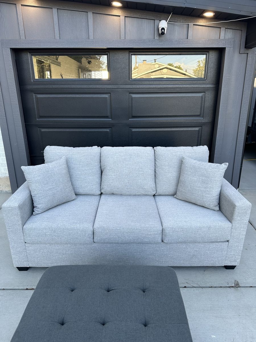 Light Grey Fabric Sofa with Matching Pillows and Ottoman