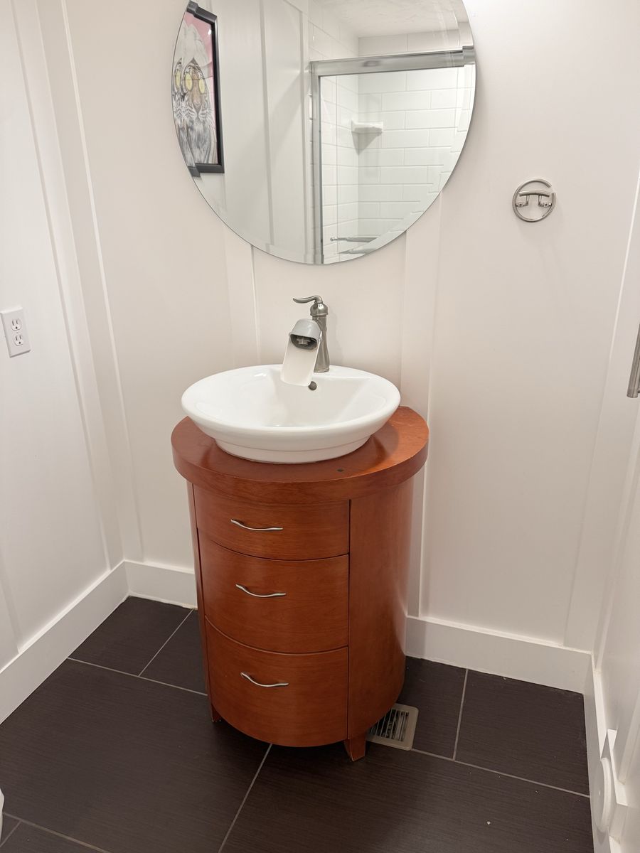 Round Wood Bathroom Vanity with Ceramic Sink and Faucet - 24 Inch and sink