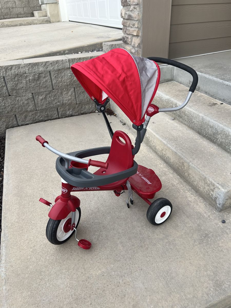 Radio Flyer Red 4-in-1 Stroll 'N Trike - Toddler Push Tricycle with Canopy