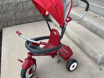 Radio Flyer Red 4-in-1 Stroll 'N Trike - Toddler Push Tricycle with Canopy