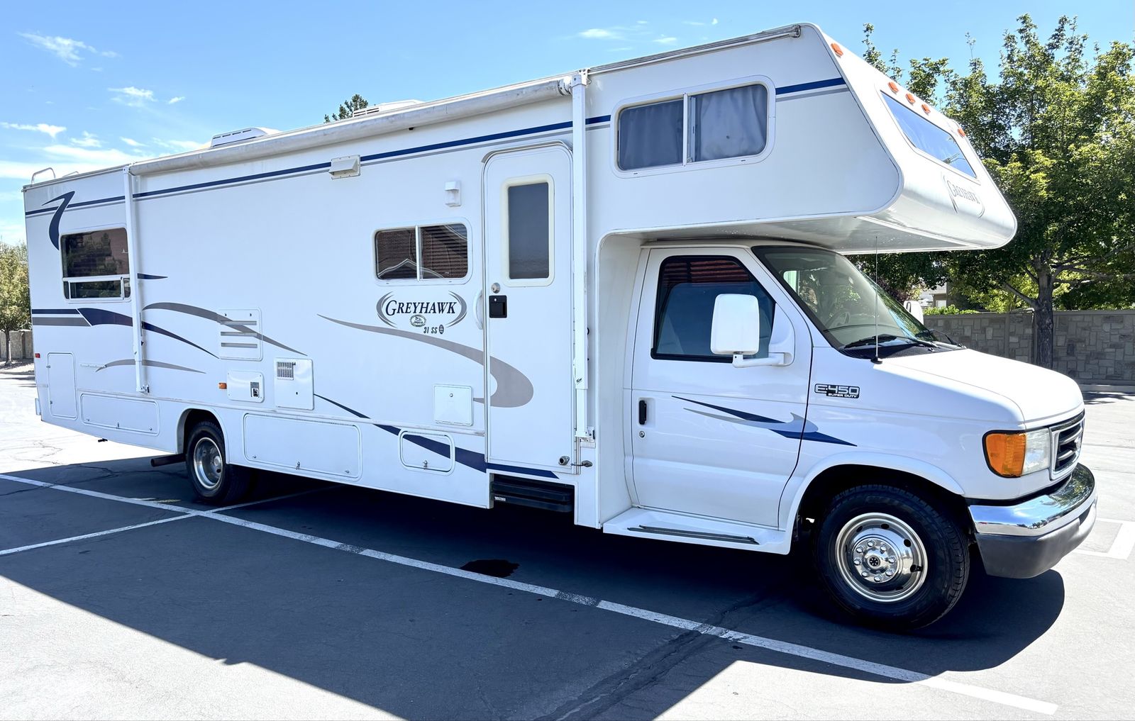 2004 grey hawk 28FT class C whit only 15K miles very low whit super slide out immaculate condition ready to travel the world!
