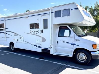 2004 grey hawk 28FT class C whit only 15K miles very low whit super slide out immaculate condition ready to travel the world!