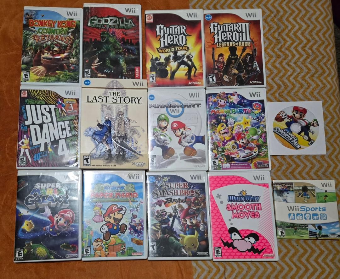 Wii game bundle including Guitar Hero World Tour! trades considered!