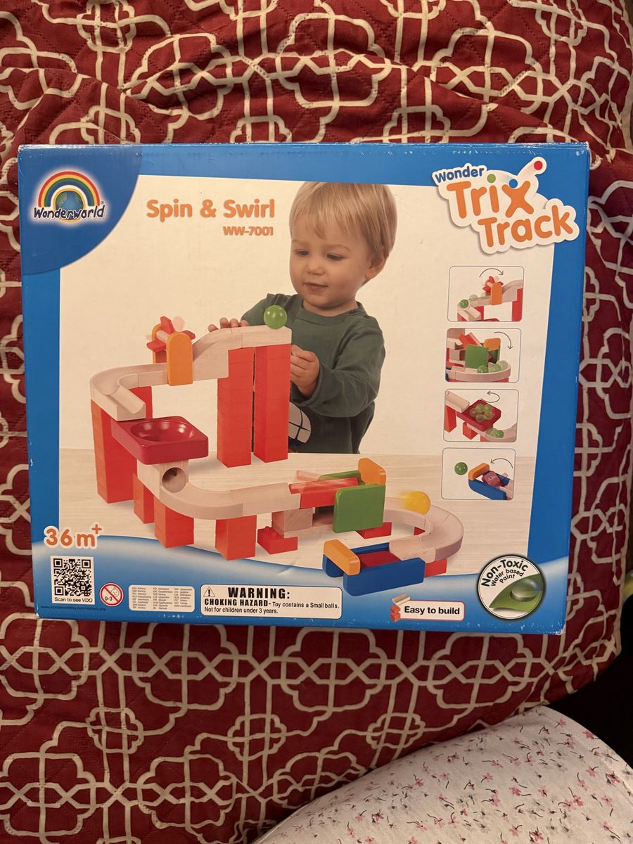 Wonderworld Trix Track Spin & Swirl, Tracks & Ball, and Throw & Roll Wooden Marble Run Sets