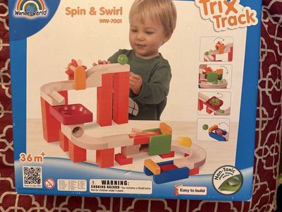 Wonderworld Trix Track Spin & Swirl, Tracks & Ball, and Throw & Roll Wooden Marble Run Sets
