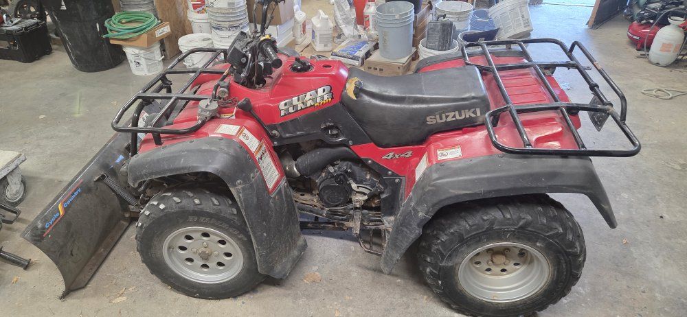 2001 Suzuki quadrunner 500 4-wheeler with snow plow