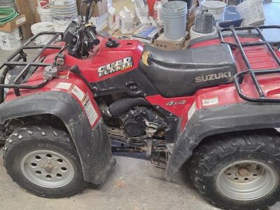 2001 Suzuki quadrunner 500 4-wheeler with snow plow
