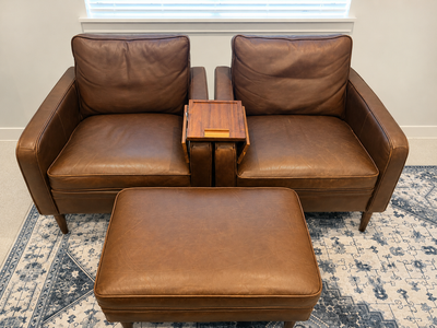 Two Genuine Leather Chairs + Matching Ottoman