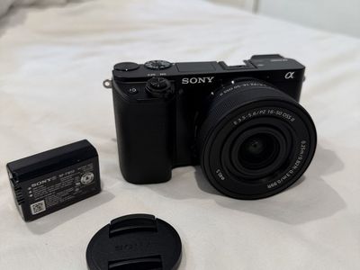 Sony Alpha a6100 Mirrorless Camera with E 3.5-5.6/PZ 16-50 OSS II Lens & Battery