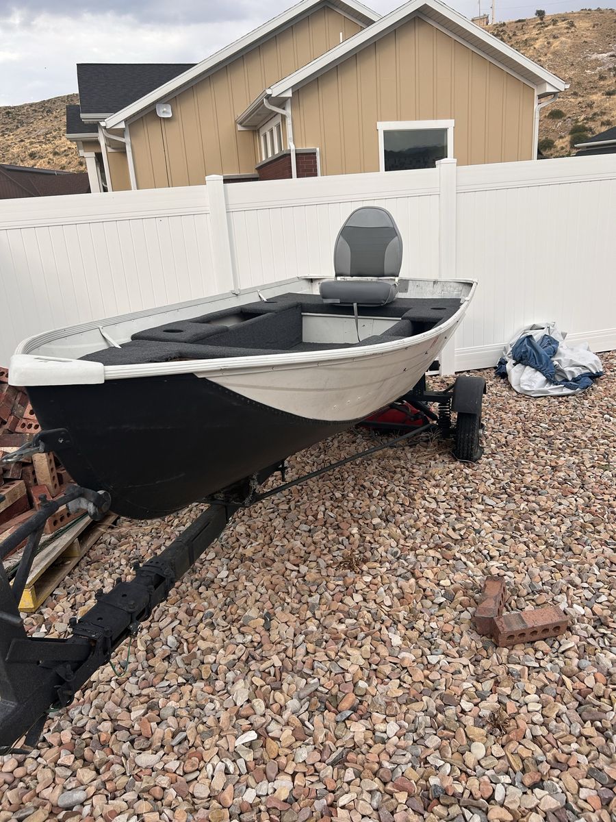 Aluminum Fishing Boat with Trailer and Evinrude 9.9 Outboard Motor