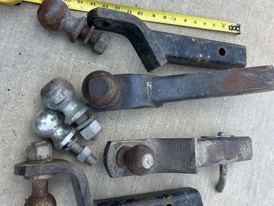 Trailer hitches Assorted sizes 2” and 2 -5/16” $35 each set.