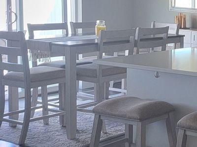Ashley Furniture - Skempton - Counter Height Dining Table and 6 Chairs - Light Gray Wood with Upholstered Seats