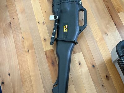 Kolpin transport gun box and mount for a 4 wheeler with lock.