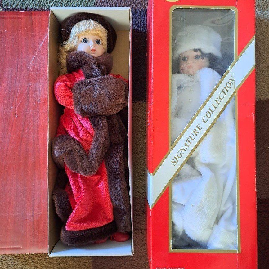 2 old porcelain dolls