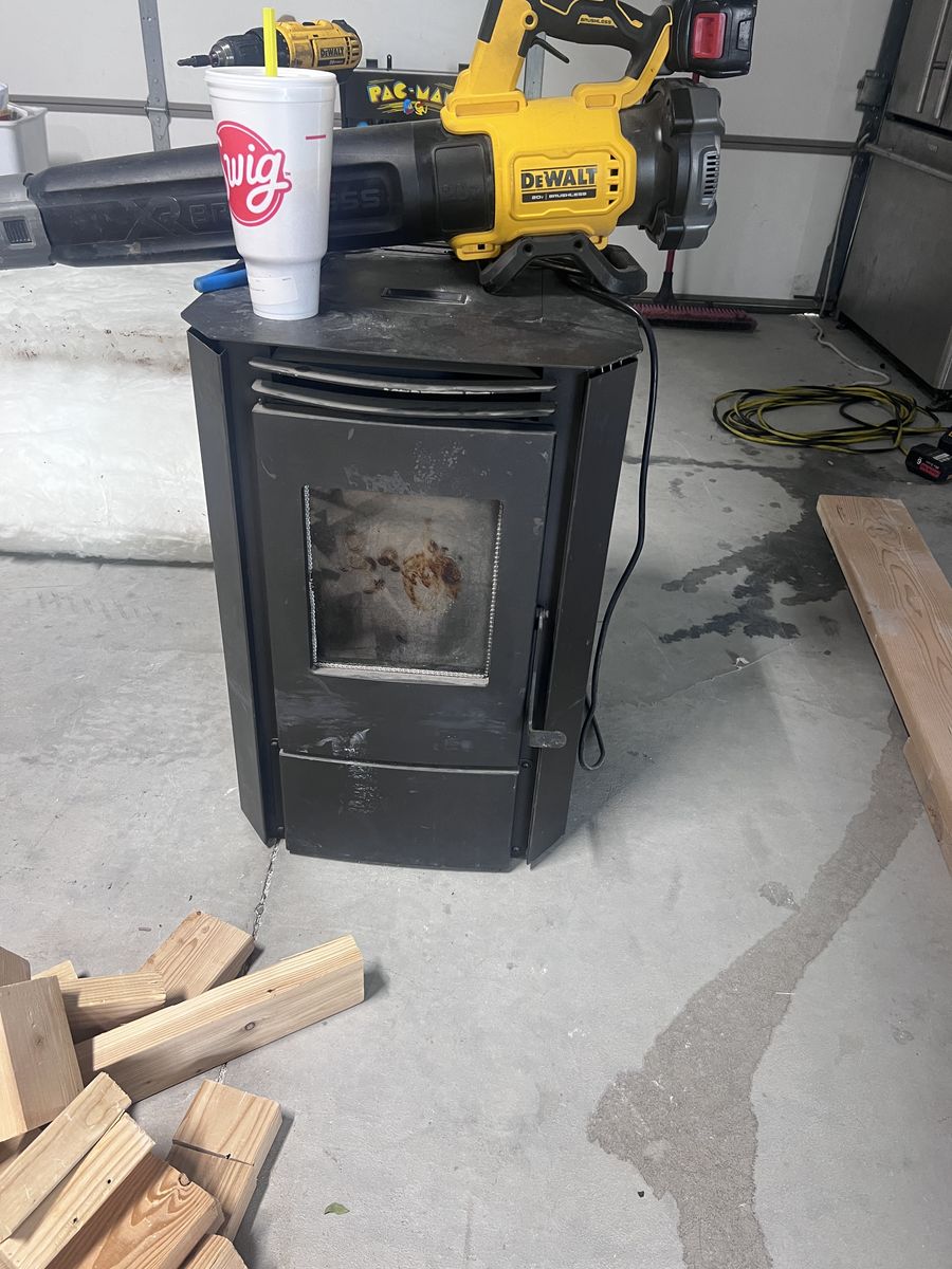 Efficient Black Pellet Stove Heater - Manual Controls for Wood Fuel