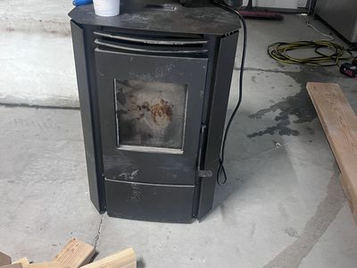 Efficient Black Pellet Stove Heater - Manual Controls for Wood Fuel