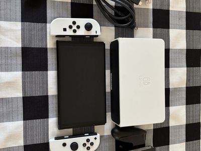 Nintendo Switch OLED Model Console with White Joy-Cons, Dock, and Cables