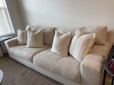 Spacious Beige Fabric Sofa with Throw Pillows - Excellent Condition