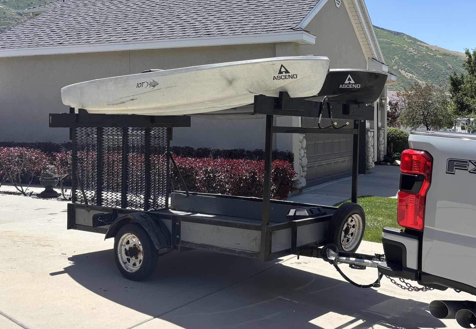 2 Ascend 10T Kayaks and the Trailer to Haul them!