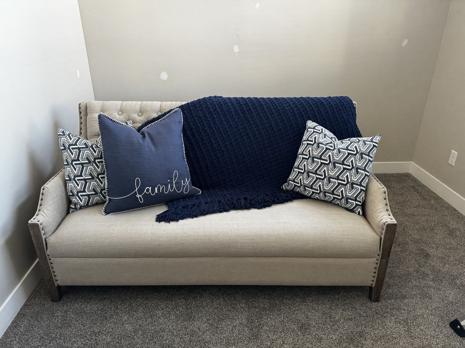 Sullinger Beige Settee