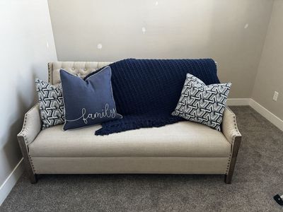 Sullinger Beige Settee