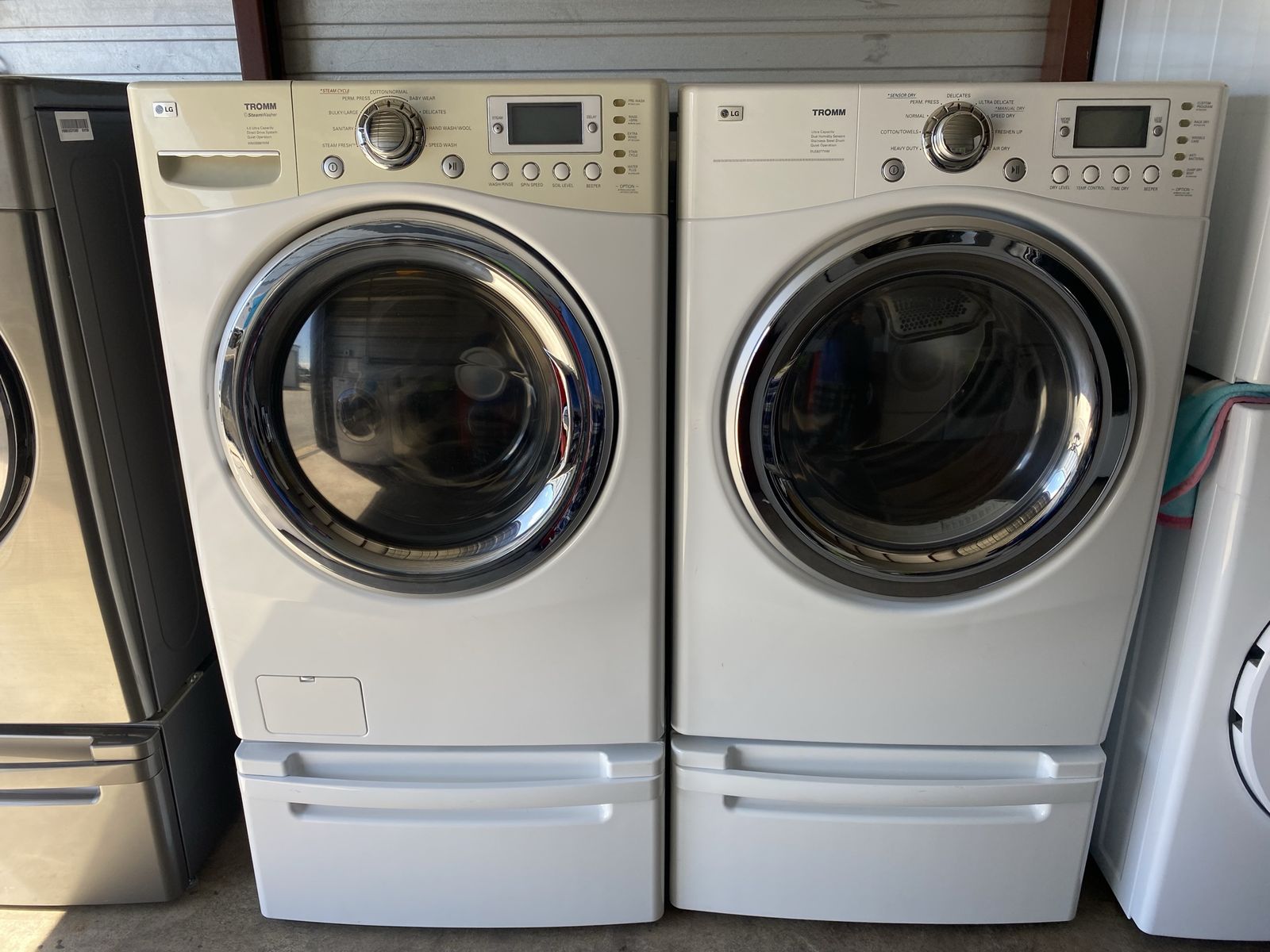 LG tromm and 4 prong electric dryer with pedestals