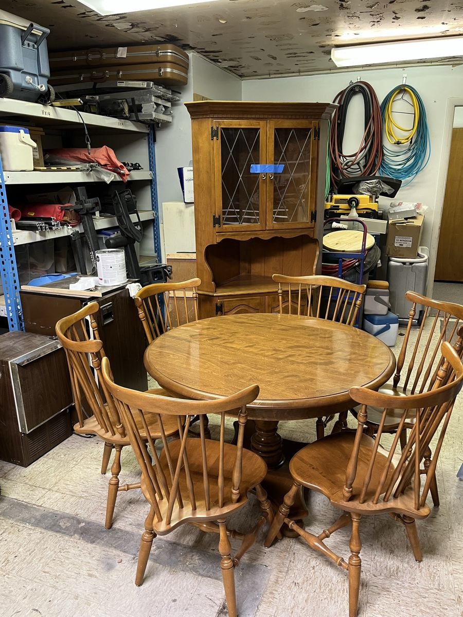 Table and chairs and hutch