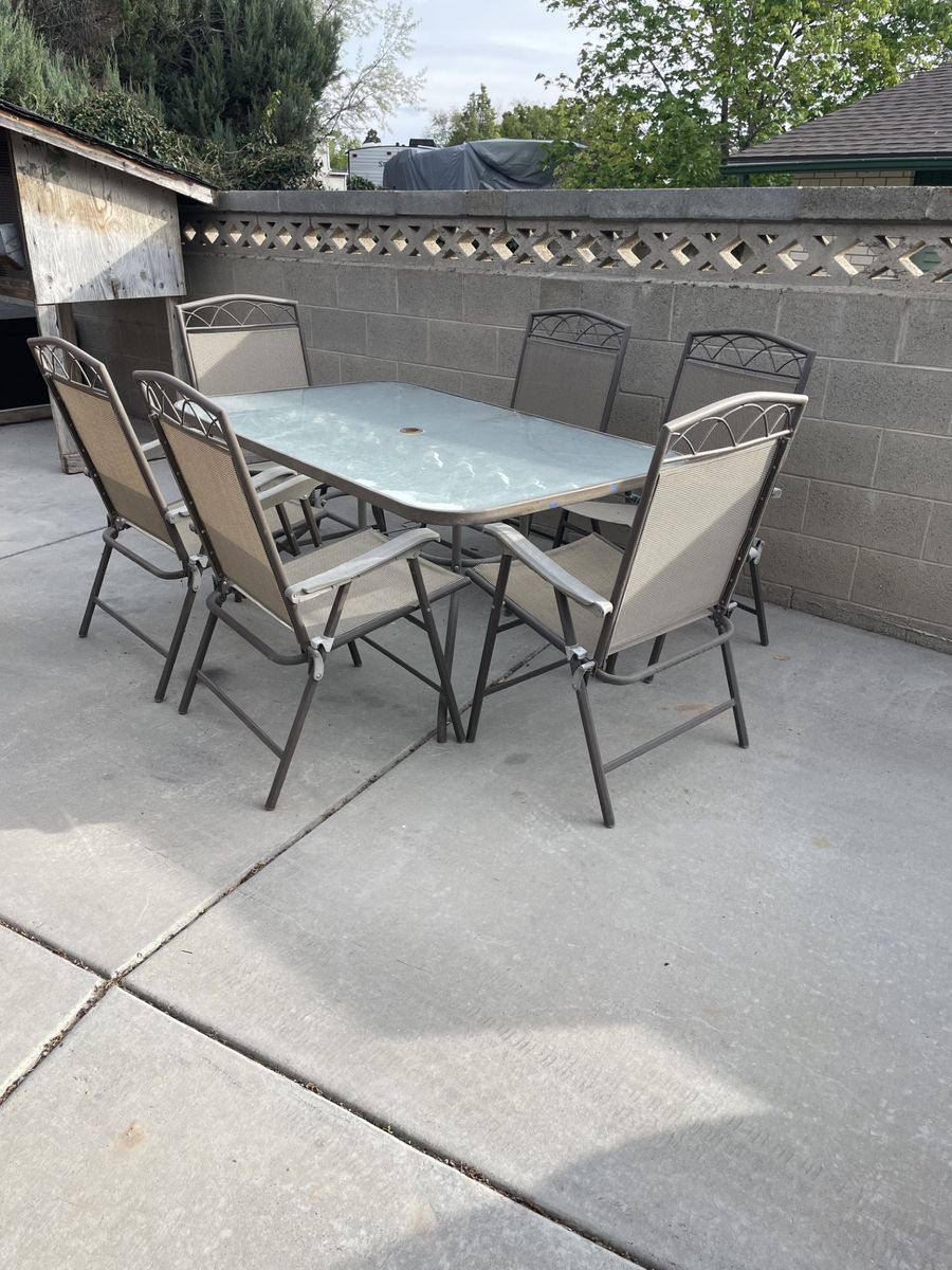 Outdoor Glass Table with 6 Chairs