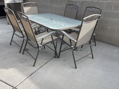 Outdoor Glass Table with 6 Chairs
