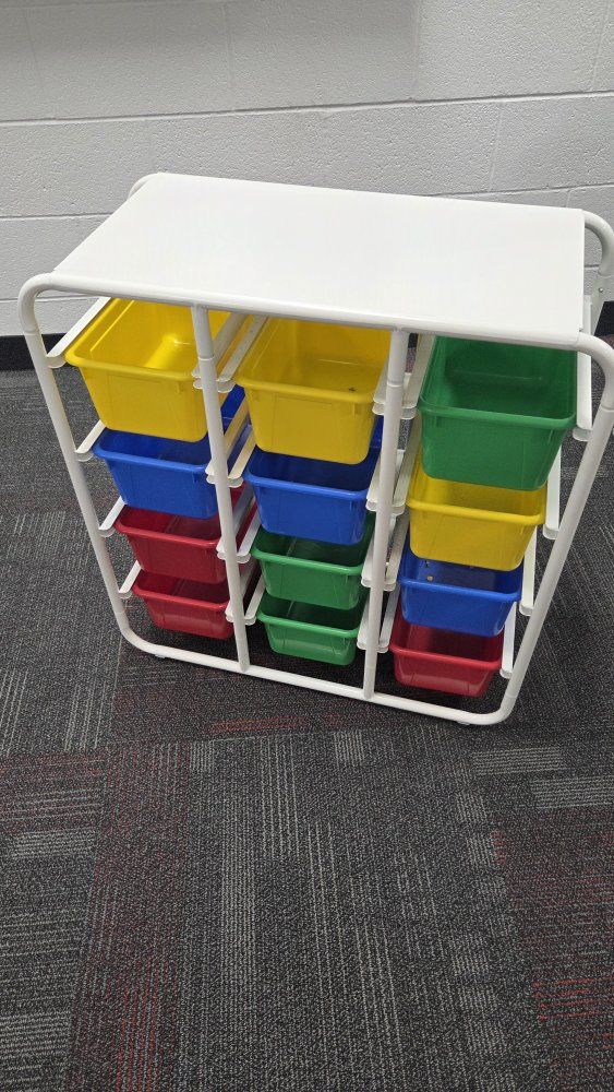 White Frame Storage Unit with 12 Colorful Plastic Bins - Ideal for Toys or Craft Supplies