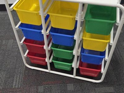 White Frame Storage Unit with 12 Colorful Plastic Bins - Ideal for Toys or Craft Supplies