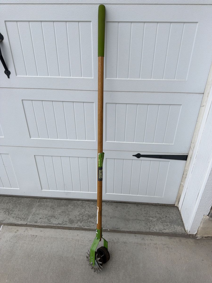 Dual wheel lawn edger.