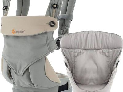 Ergobaby Four Position 360 Baby Carrier in grey with an accompanying infant insert.