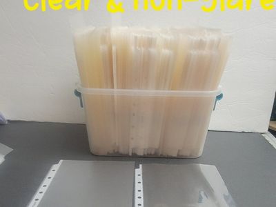 Half Sheet Clear Sheet Protectors and 9x7 Binders Covered in Contact Paper