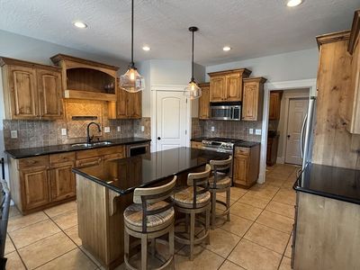 Wood Kitchen Cabinets Set with Island and Granite countertops