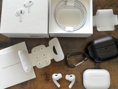 AirPods Pro 2 With Case, Unused Ear Tips, New Cable And Original Box With Instructions