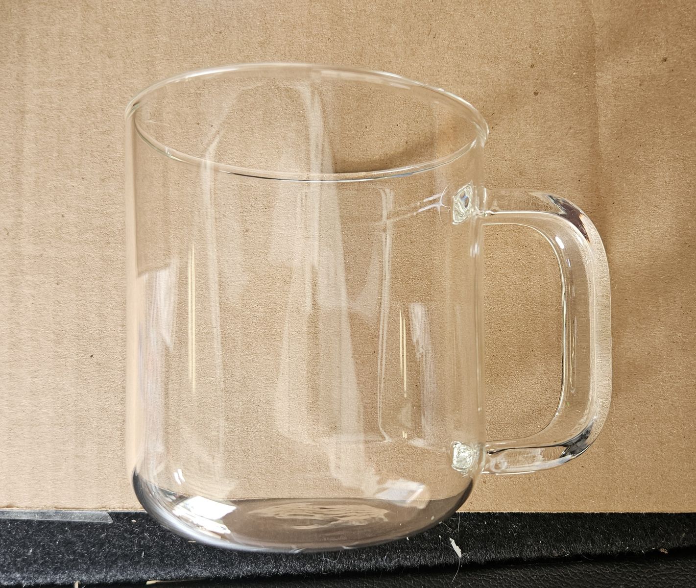 2 glass coffee cups and grinder