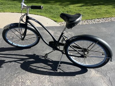 Black Rat Rod Cruiser Bike with Blue Rims and Flame Decals